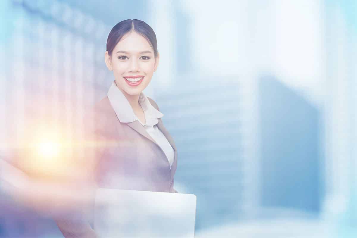 business person with a cityscape behind her; talent intelligence helps banks concept