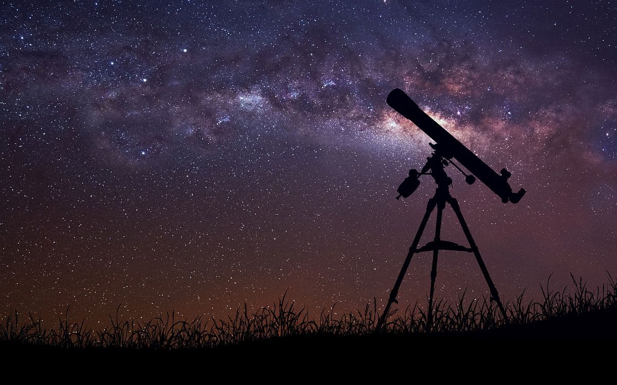 space and stars with silhouette of telescope; transparent job descriptions concept