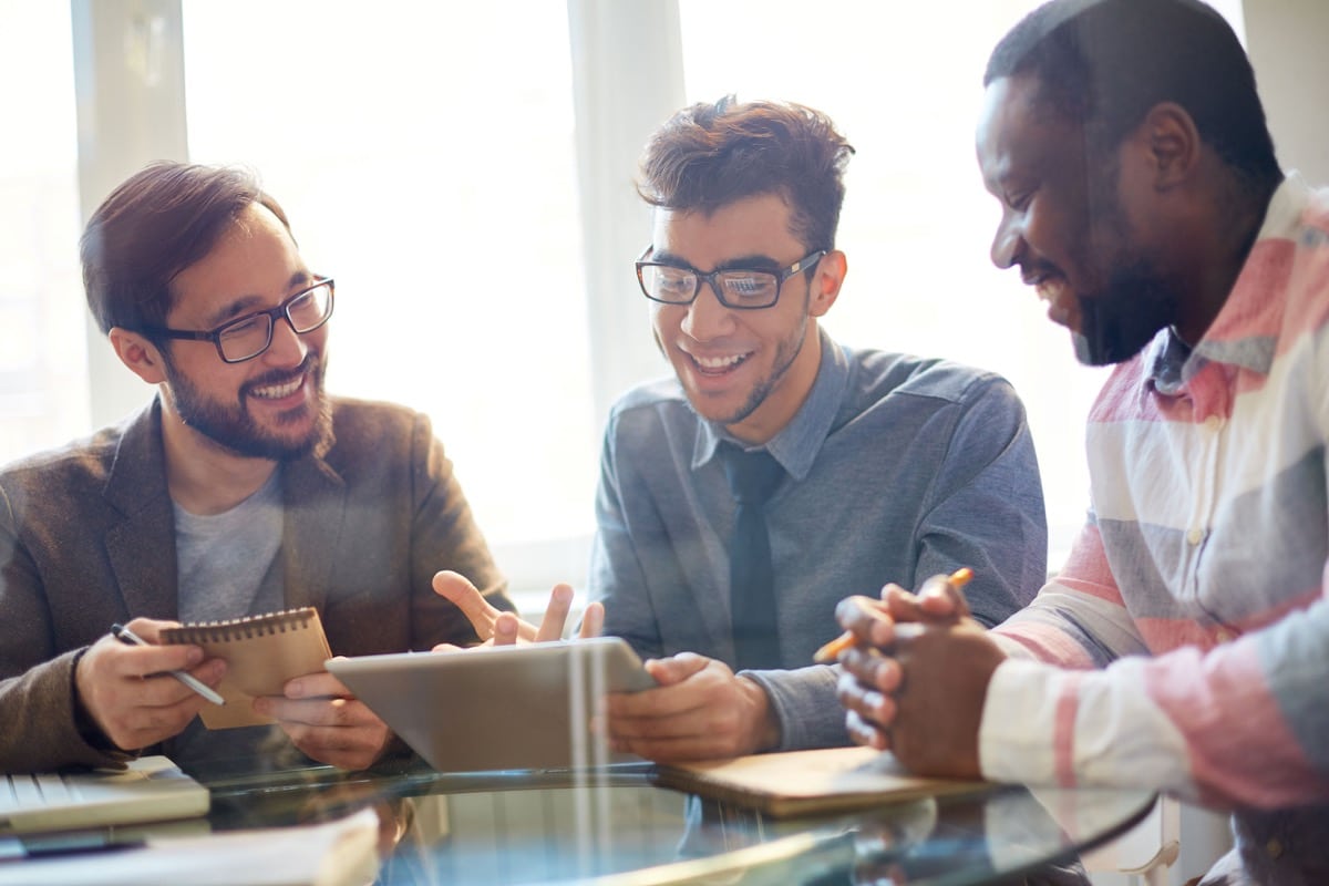 Businessmen discussing Employee Retention - Better Employee Retention Starts With Recruitment