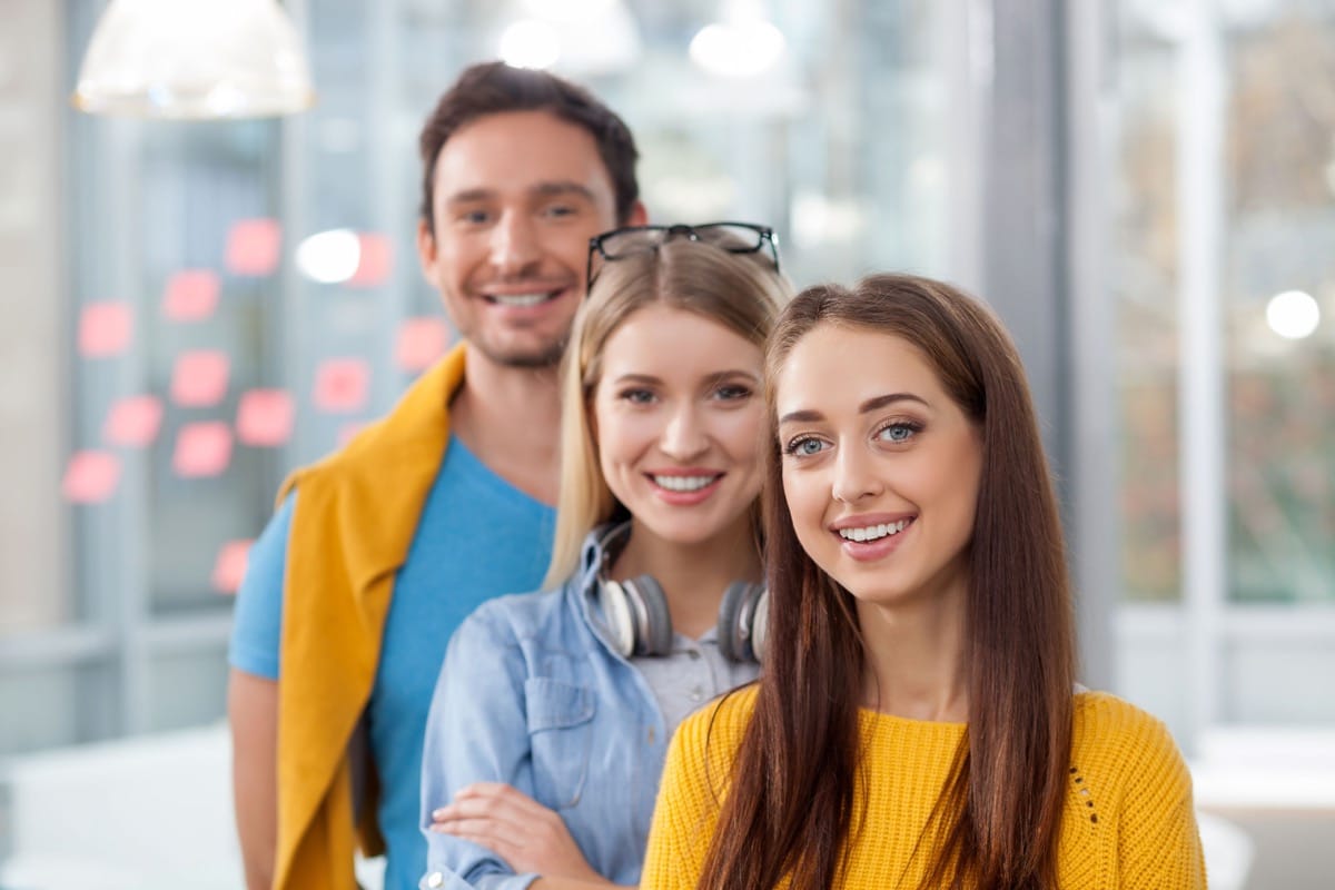Professional creative team is working together in office; positive candidate experience concept