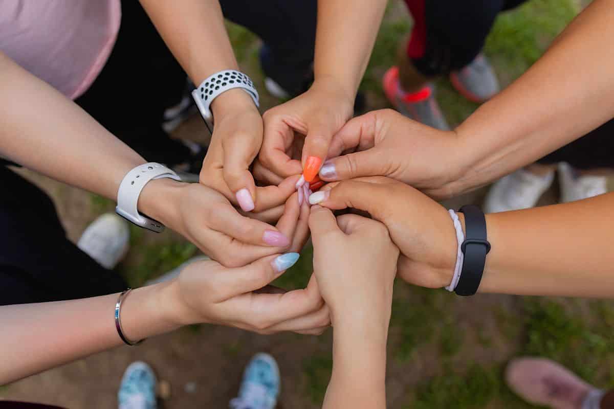 Group of people supporting each others. Concept about team work and friendship