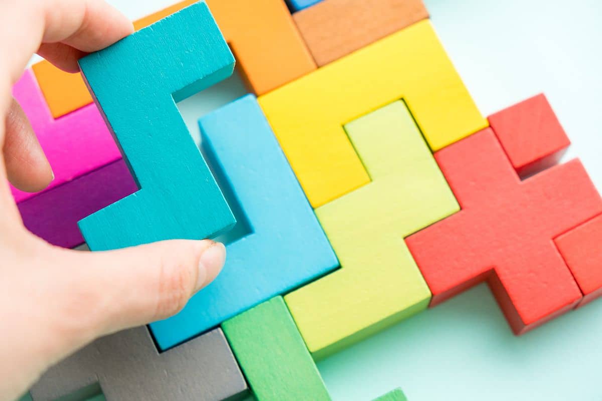 Puzzle on wooden boards; career management concept