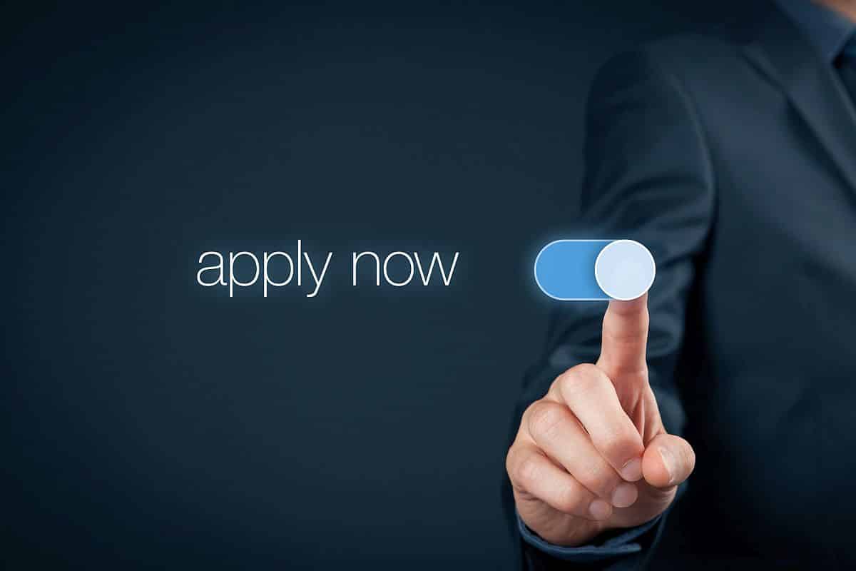 Businessman switch-on button apply now; skills match concept