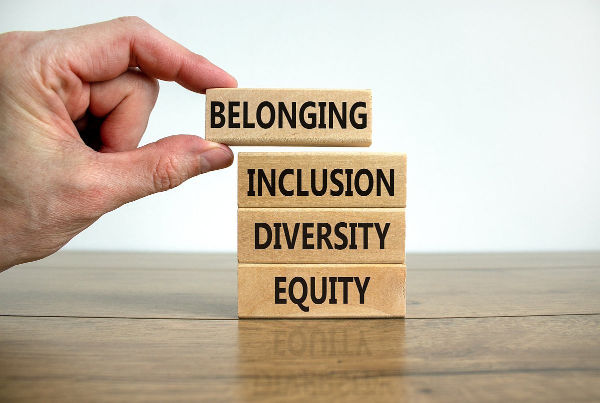 stack of building blocks which read Belonging, Diversity, Equity, Inclusion; successful DEI implementation concept