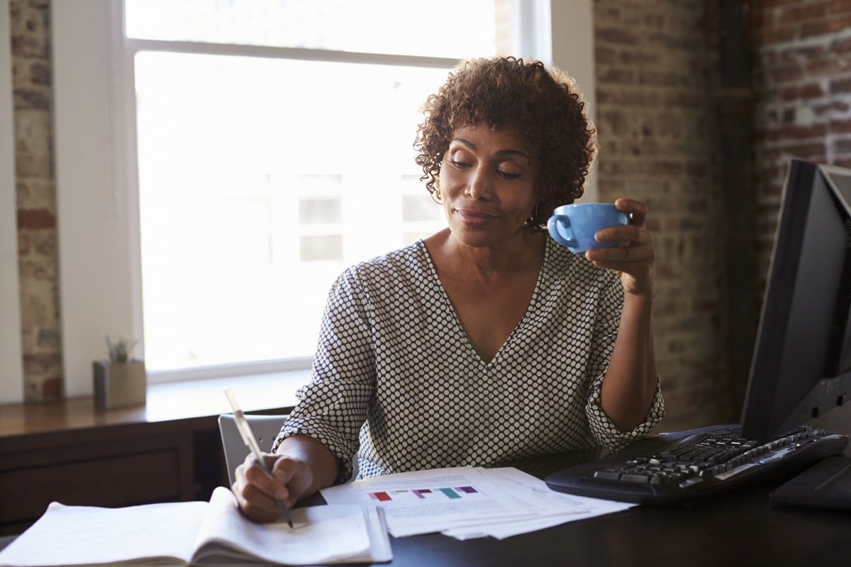 Mature Businesswoman Working In Office; inclusive candidate interviews concept