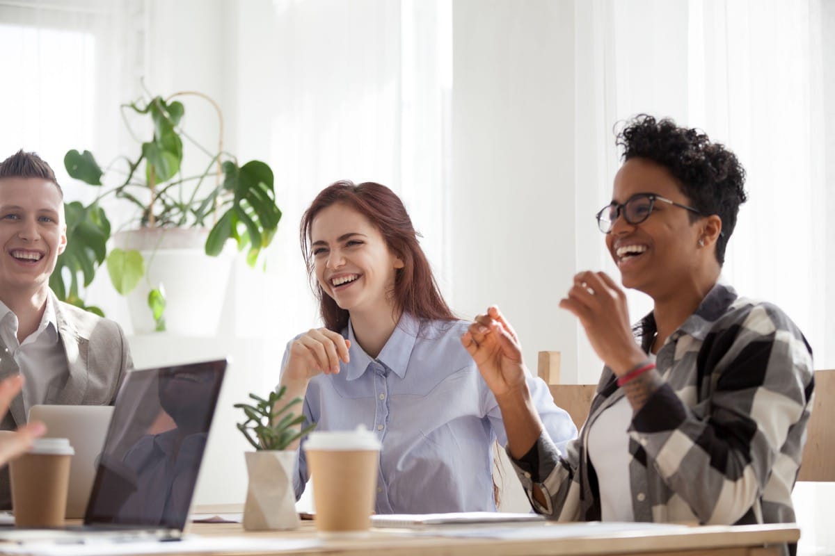 Happy joyful diverse business people; future of hiring concept