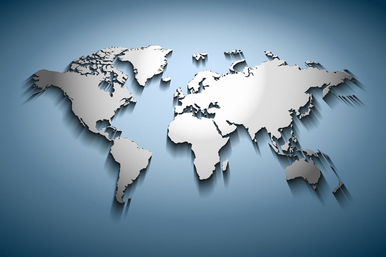 silver 3-d map of the world representing the global scope of the upcoming return to work