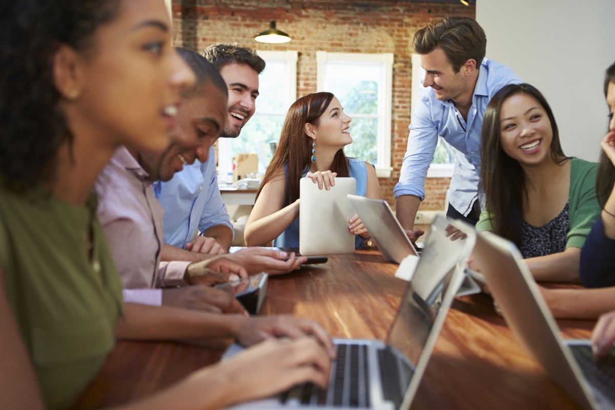 Businessmen And Businesswomen Meeting To Discuss Ideas; Predict Candidate Success concept